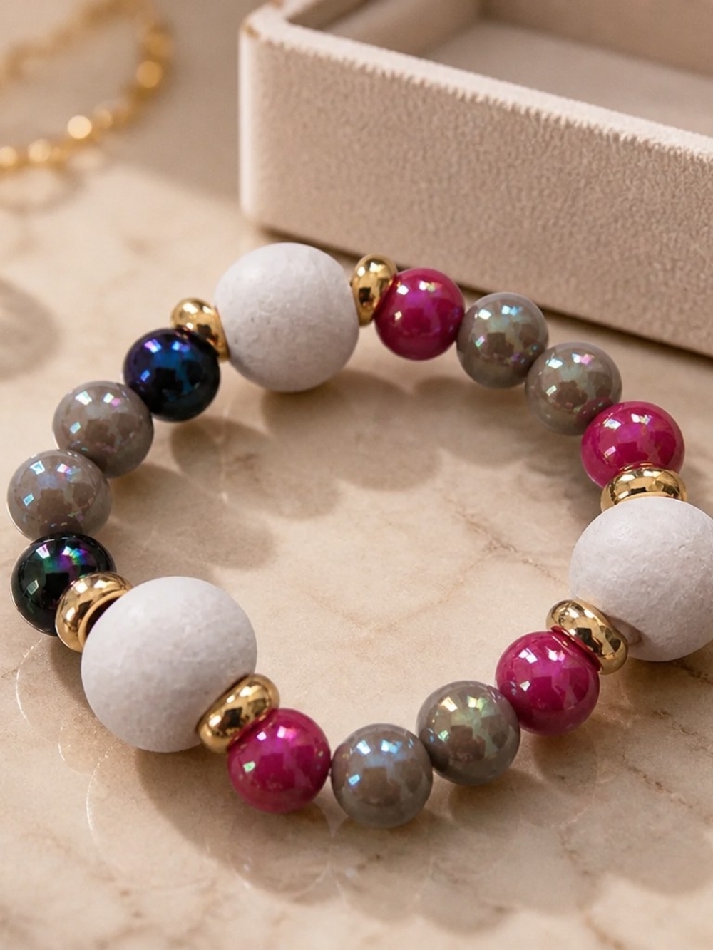 Handcrafted Multicolor Beaded Stretch Bracelet with Gold Accents